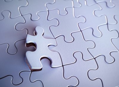 A puzzle piece that represents the "missing piece" in the speaking and awards programs categories blog post