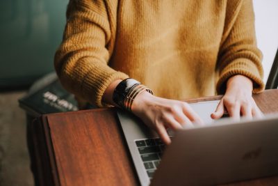 Woman at keyboard Launching a Business